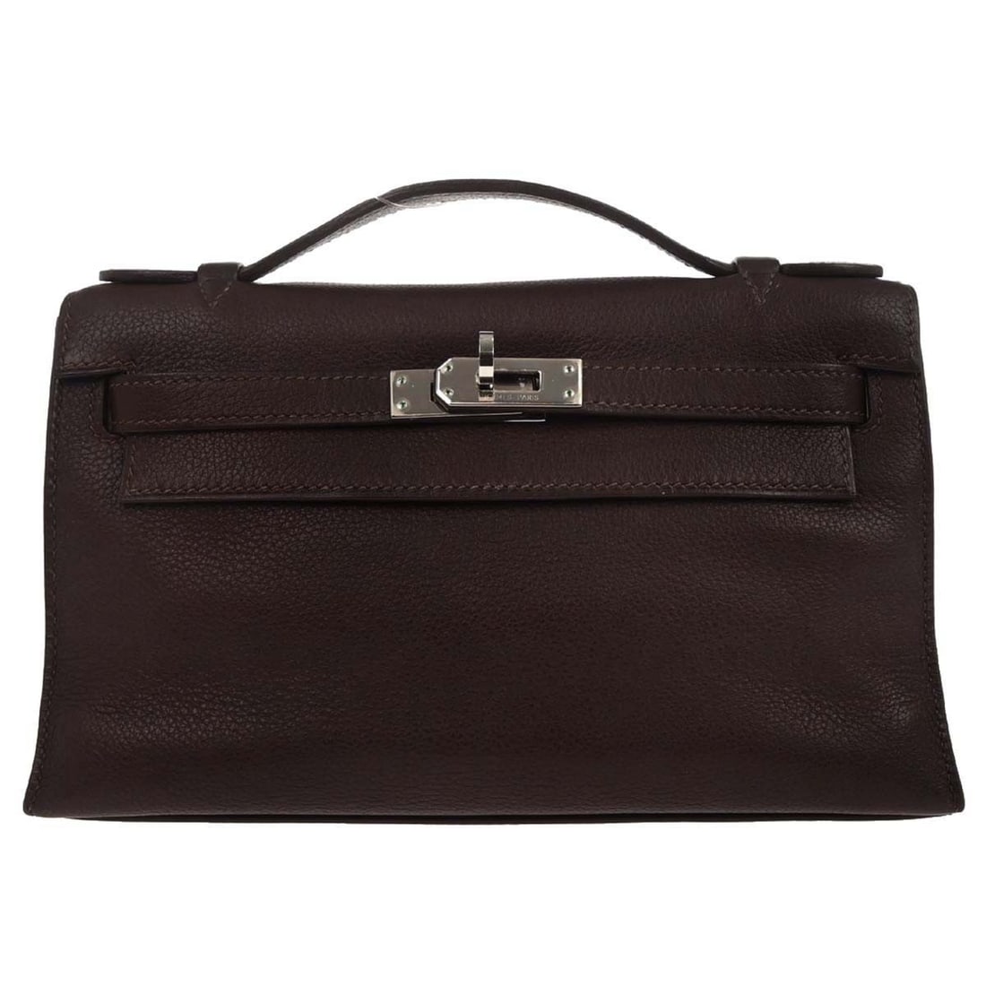 Havane Evergrain Kelly Pochette Small Top Handle Bag by Hermes: Havane Evergrain Kelly Pochette Small Top Handle Bag by Hermes This Hermes Kelly Pochette handbag features Evergrain leather in a rich Havane color. Designed with a top handle, turn lock closure, and 