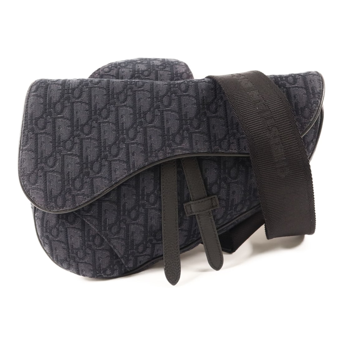 Dior Saddle Canvas Black Shoulder Bag CD SHW: Dior Saddle Canvas Black Shoulder Bag CD SHW This Christian Dior Saddle Bag is crafted from black canvas and features a classic shoulder bag design. It offers a practical size with a height of 7.3 inc