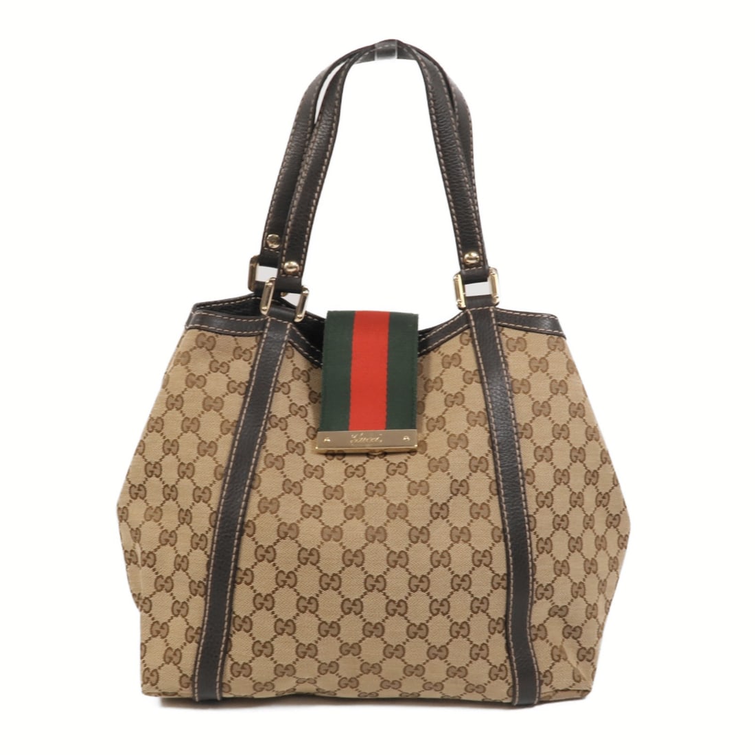 Gucci Brown GG Canvas Women Shoulder Bag: Gucci Brown GG Canvas Women Shoulder Bag This GUCCI GG shoulder bag features the iconic GG canvas in a classic brown color. Designed for women, it offers a versatile and stylish accessory for everyday