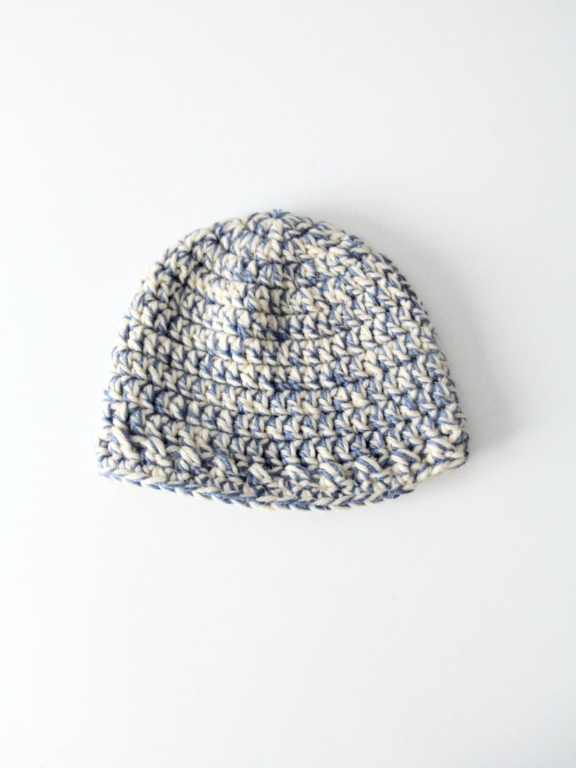 Two Tone Hand Knit Vintage Beanie Hat in Blue and Cream: Two Tone Hand Knit Vintage Beanie Hat in Blue and Cream This vintage hand-knit winter hat features a cozy beanie style with a two-tone pattern in cerulean blue and creamy white. Soft and warm, it is i