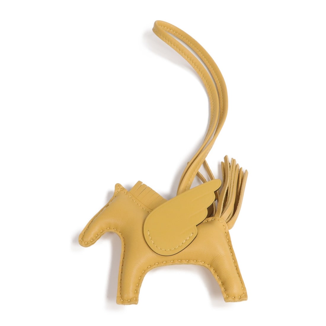 Rodeo Pegase PM Sesame Charm Lambskin Leather Beige by Hermes: Rodeo Pegase PM Sesame Charm Lambskin Leather Beige by Hermes This Hermes Rodeo Pegase PM charm is crafted from Milo lambskin leather in a beige color. Designed as a unisex accessory, it features a re
