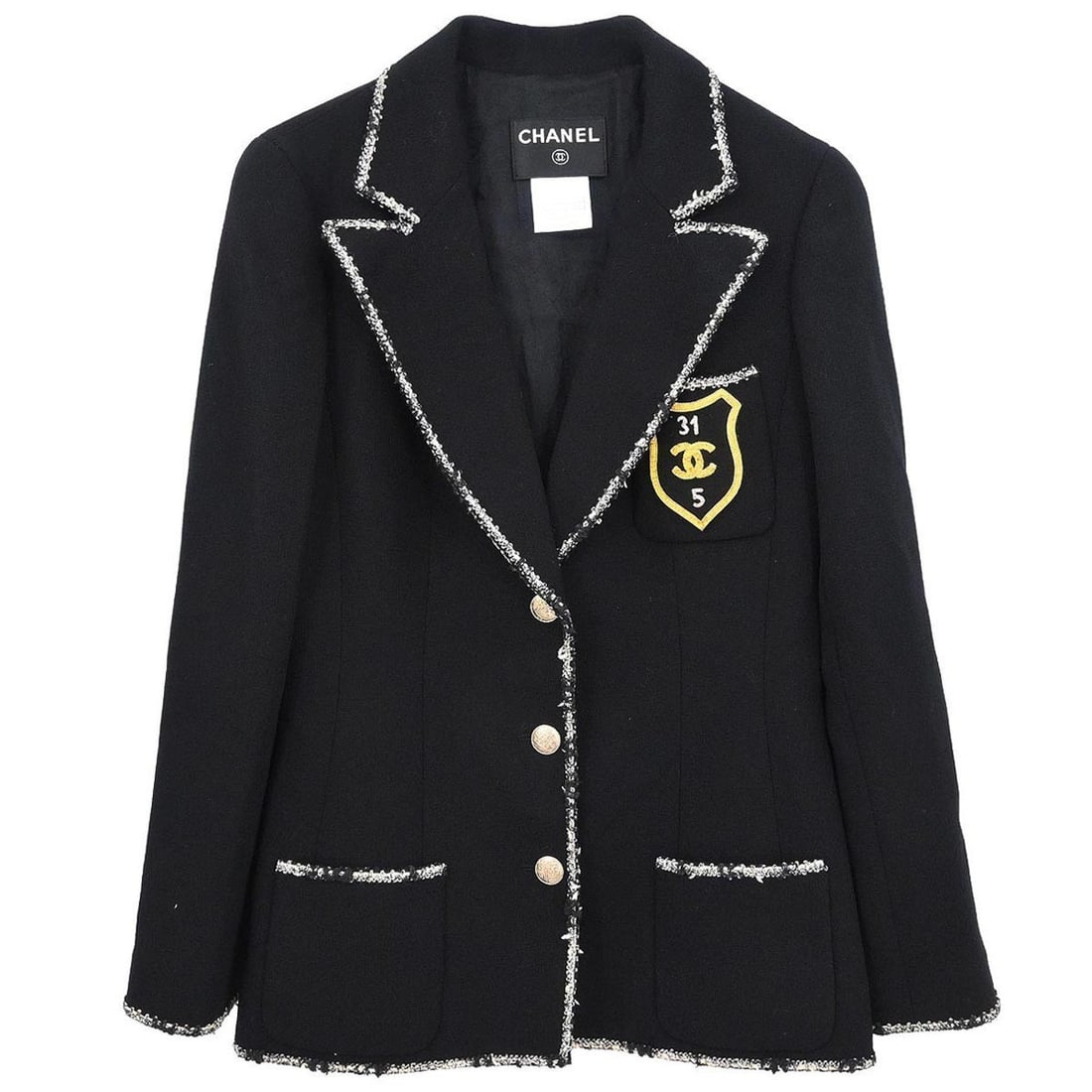 Chanel Black Wool Logo Button Mid-Length Single Breasted Jacket Size 38: Chanel Black Wool Logo Button Mid-Length Single Breasted Jacket Size 38 This Chanel single breasted jacket is crafted from 100% wool in a classic black color. Designed with a mid-length cut and long s