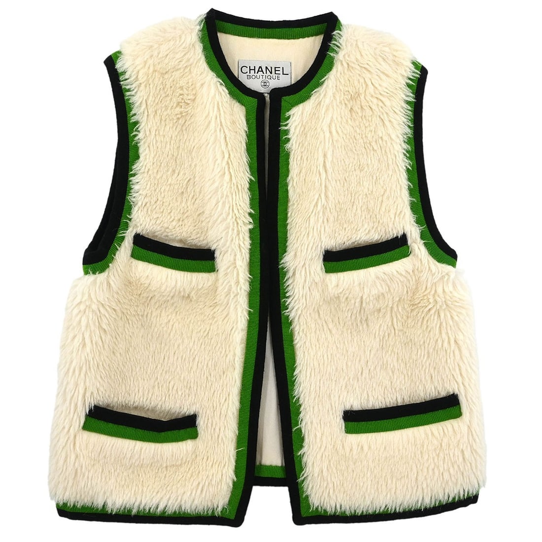 Chanel Vintage White Sleeveless Vest Jacket Casual Style: Chanel Vintage White Sleeveless Vest Jacket Casual Style Elevate your wardrobe with this vintage Chanel Sleeveless Vest Jacket, perfect for casual occasions. Crafted from a luxurious blend of 64% alpa