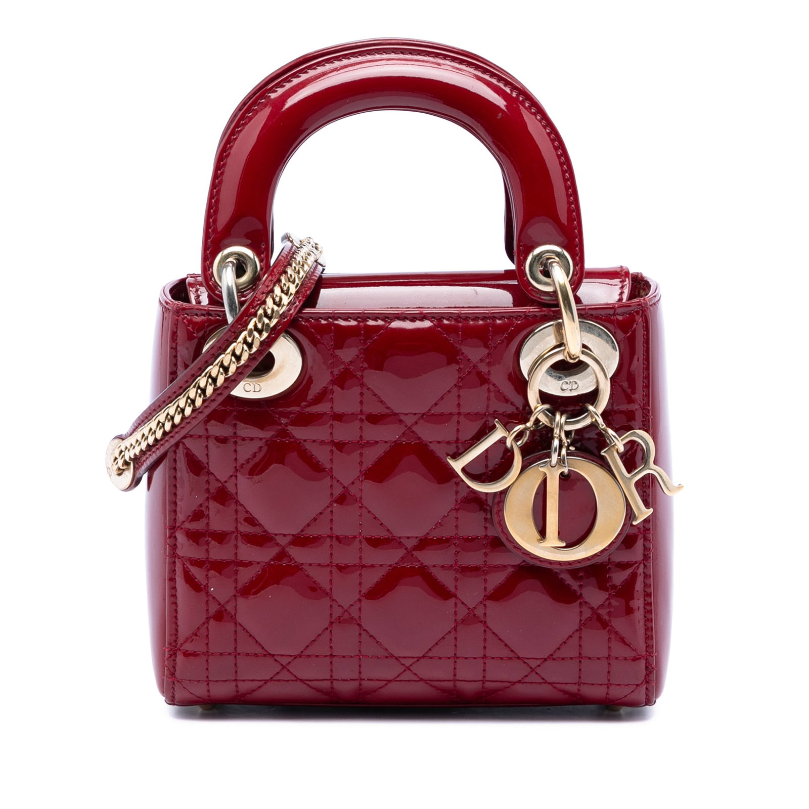 Dior Mini Patent Cannage Lady Dior Red Leather Bag: Dior Mini Patent Cannage Lady Dior Red Leather Bag This Mini Patent Cannage Lady Dior bag features a quilted patent leather exterior in red, complemented by flat leather top handles and a detachable c
