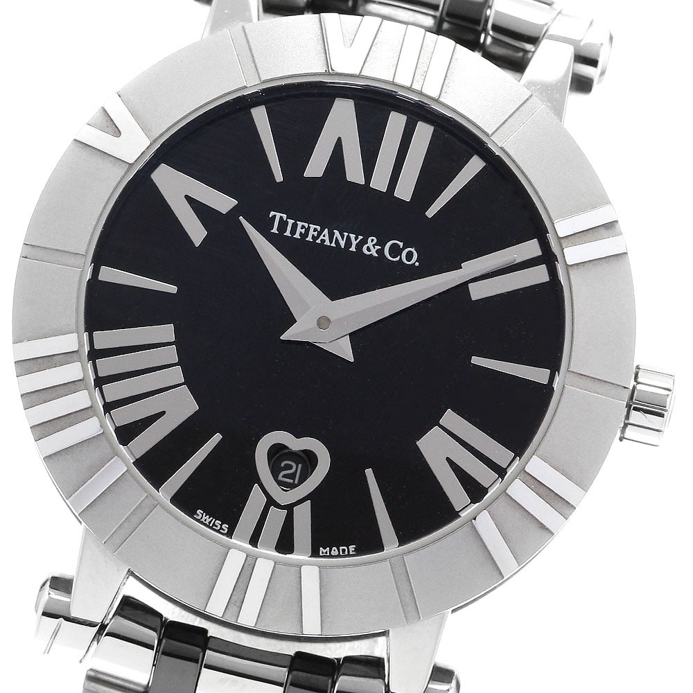 Tiffany Co Atlas women's quartz date wristwatch 30mm: Tiffany Co Atlas women's quartz date wristwatch 30mm This Tiffany & Co. Atlas Date Quartz ladies wristwatch features a stainless steel and ceramic case and bracelet, complemented by a black dial. The 