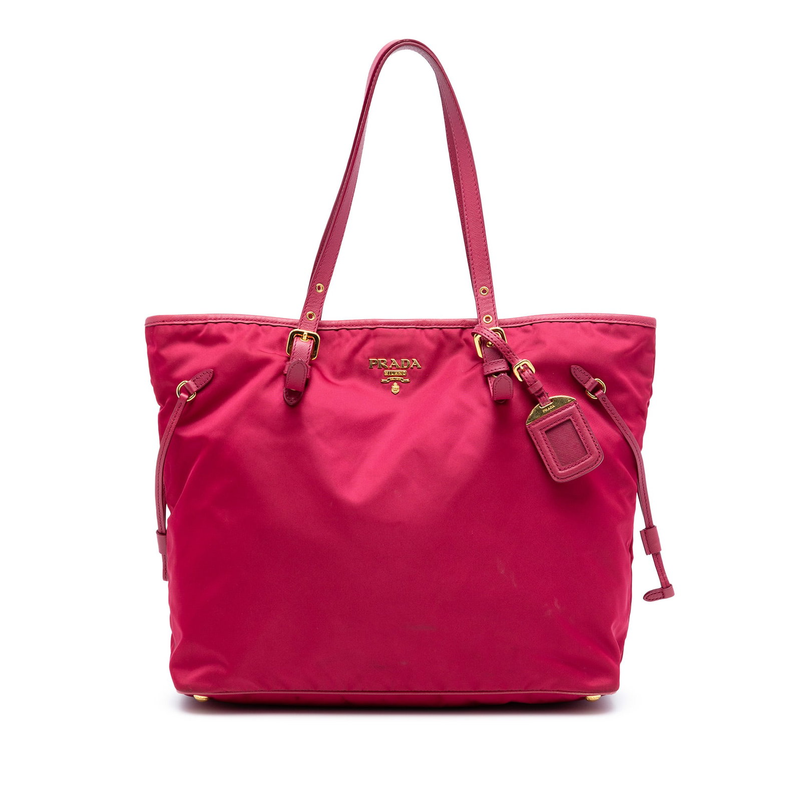 Pink Nylon Tote with Saffiano Leather Trim by Prada: Pink Nylon Tote with Saffiano Leather Trim by Prada This Prada Saffiano Trimmed Tessuto Tote features a pink nylon body with saffiano leather trim, adjustable flat leather straps, an open top with dra