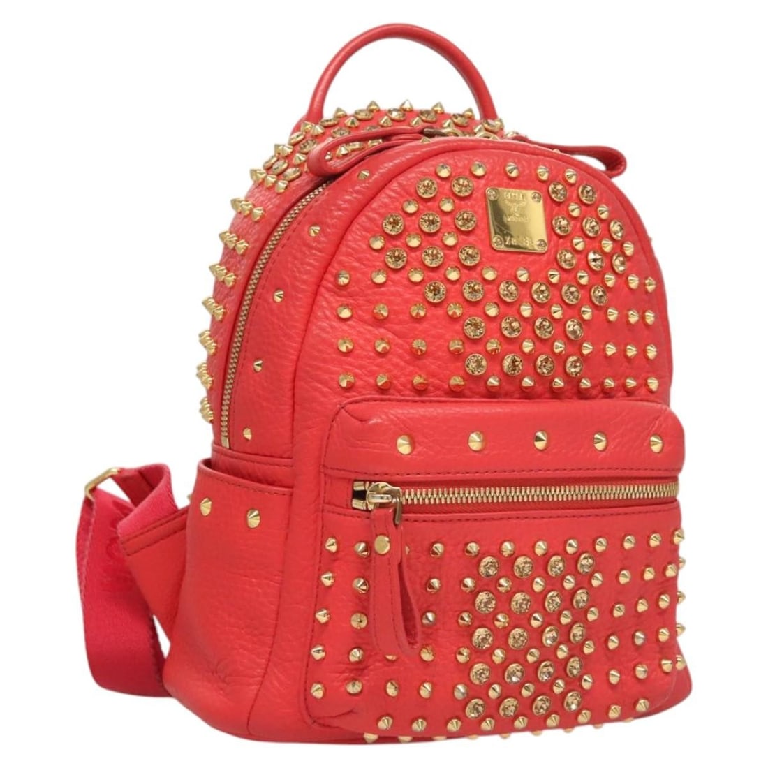 MCM Red Gold Leather Studs Backpack Auth X8136: MCM Red Gold Leather Studs Backpack Auth X8136 This MCM Studs Backpack is a stylish accessory crafted from premium leather, featuring a striking red and gold exterior. Perfect for everyday use, it off