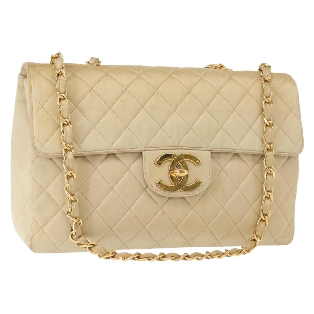 Beige Satin Chanel Vintage Classic 34cm Single Flap Shoulder Bag: Beige Satin Chanel Vintage Classic 34cm Single Flap Shoulder Bag This vintage Chanel Classic Single Flap Bag for women features a beige satin exterior with the iconic matelasse quilting. It is a chain