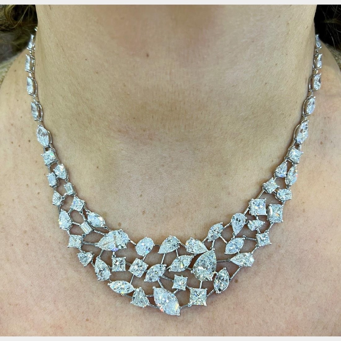 65 Diamond Platinum Necklace with 52.50 Carats Total Weight: 65 Diamond Platinum Necklace with 52.50 Carats Total Weight This platinum necklace features 65 diamonds with a total approximate weight of 52.50 carats. The diamonds are F-I color and SI1-I1 clarity. 