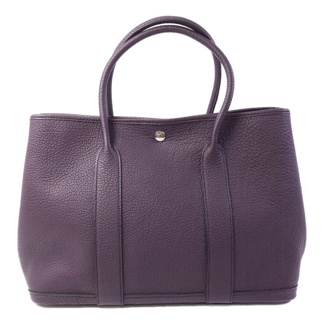 Hermes Garden Party PM Aubergine Calfskin Handbag: Hermes Garden Party PM Aubergine Calfskin Handbag This Hermes Garden Party PM handbag features Negonda leather in a rich aubergine shade, complemented by palladium hardware. The bag is crafted from ca