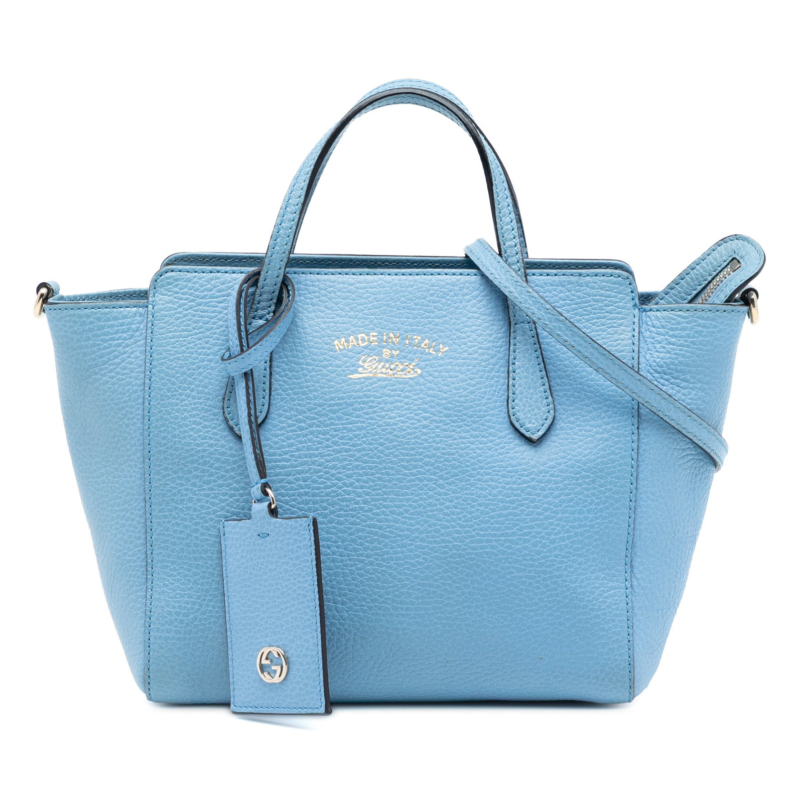 Blue Leather Mini Satchel with Detachable Strap by Gucci: Blue Leather Mini Satchel with Detachable Strap by Gucci This Gucci Mini Leather Swing Satchel showcases a blue leather body with flat leather handles and a detachable flat leather strap. It features 