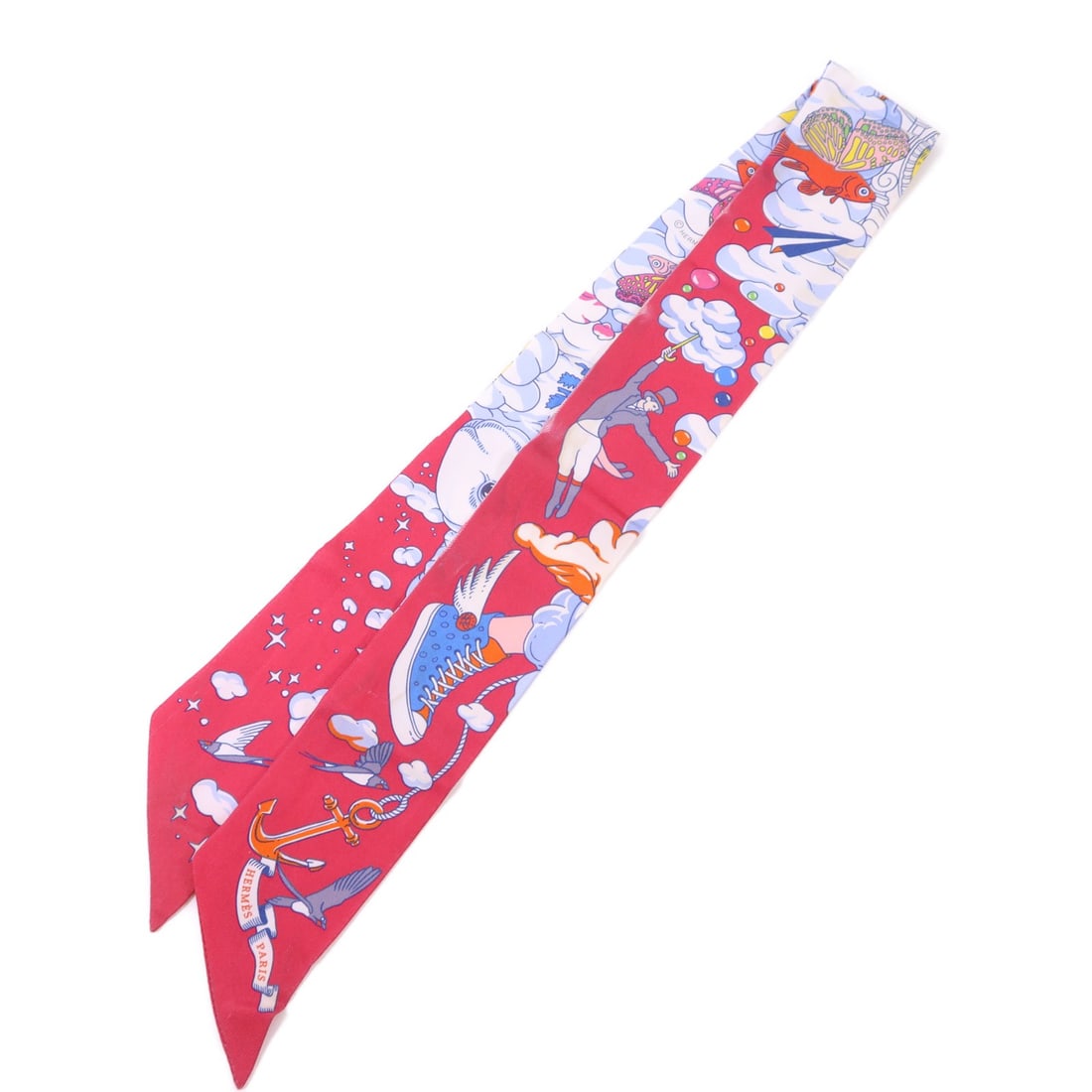 Silk Twilly Scarf by Hermes in Multicolor: Silk Twilly Scarf by Hermes in Multicolor This Hermes Twilly scarf features a vibrant multicolor design crafted from luxurious silk. Made in France, it offers a classic and versatile accessory with re