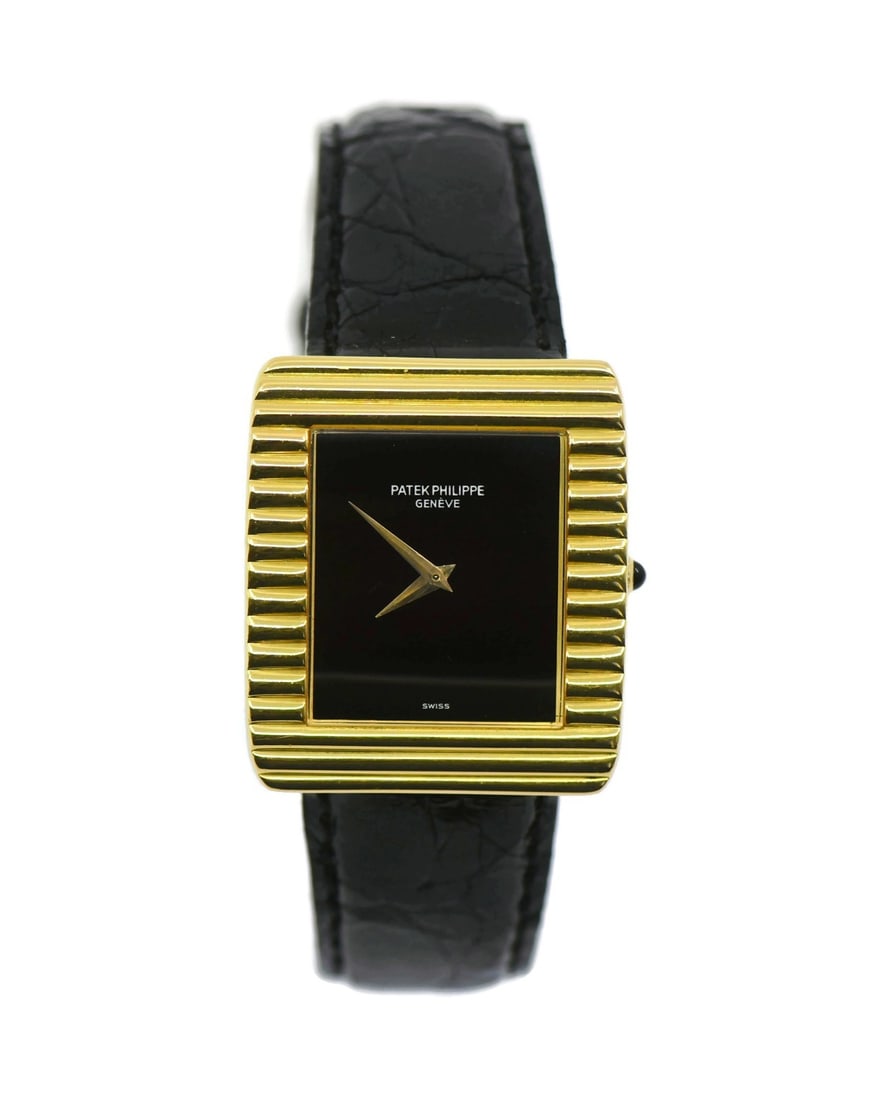 Patek Philippe Gondolo 18K Yellow Gold Manual Watch Ref 3633: Patek Philippe Gondolo 18K Yellow Gold Manual Watch Ref 3633 This exquisite Patek Philippe Gondolo wristwatch is a stunning blend of elegance and craftsmanship. Featuring a luxurious 18K yellow gold c