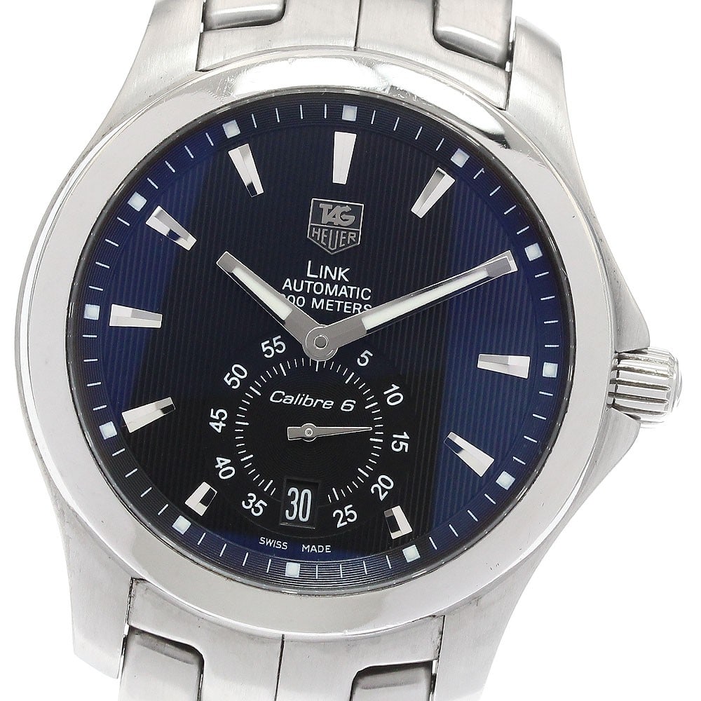 Tag Heuer Link Caliber 6 Automatic Men's Wristwatch: Tag Heuer Link Caliber 6 Automatic Men's Wristwatch This TAG Heuer Link Caliber 6 Small Seconds men's wristwatch features a stainless steel case and band with a black dial. It is powered by an automat