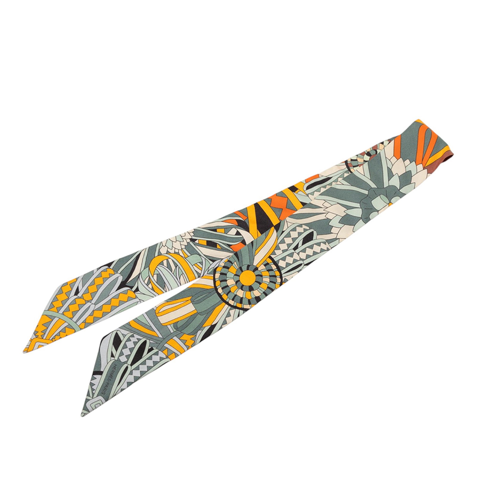 Gray Les Flots Du Cheval Silk Twilly Accessory by Hermes: Gray Les Flots Du Cheval Silk Twilly Accessory by Hermes The Hermes Les Flots Du Cheval Twilly scarf showcases a distinctive print on 100% silk in a gray color. Made in France, this stylish accessory 