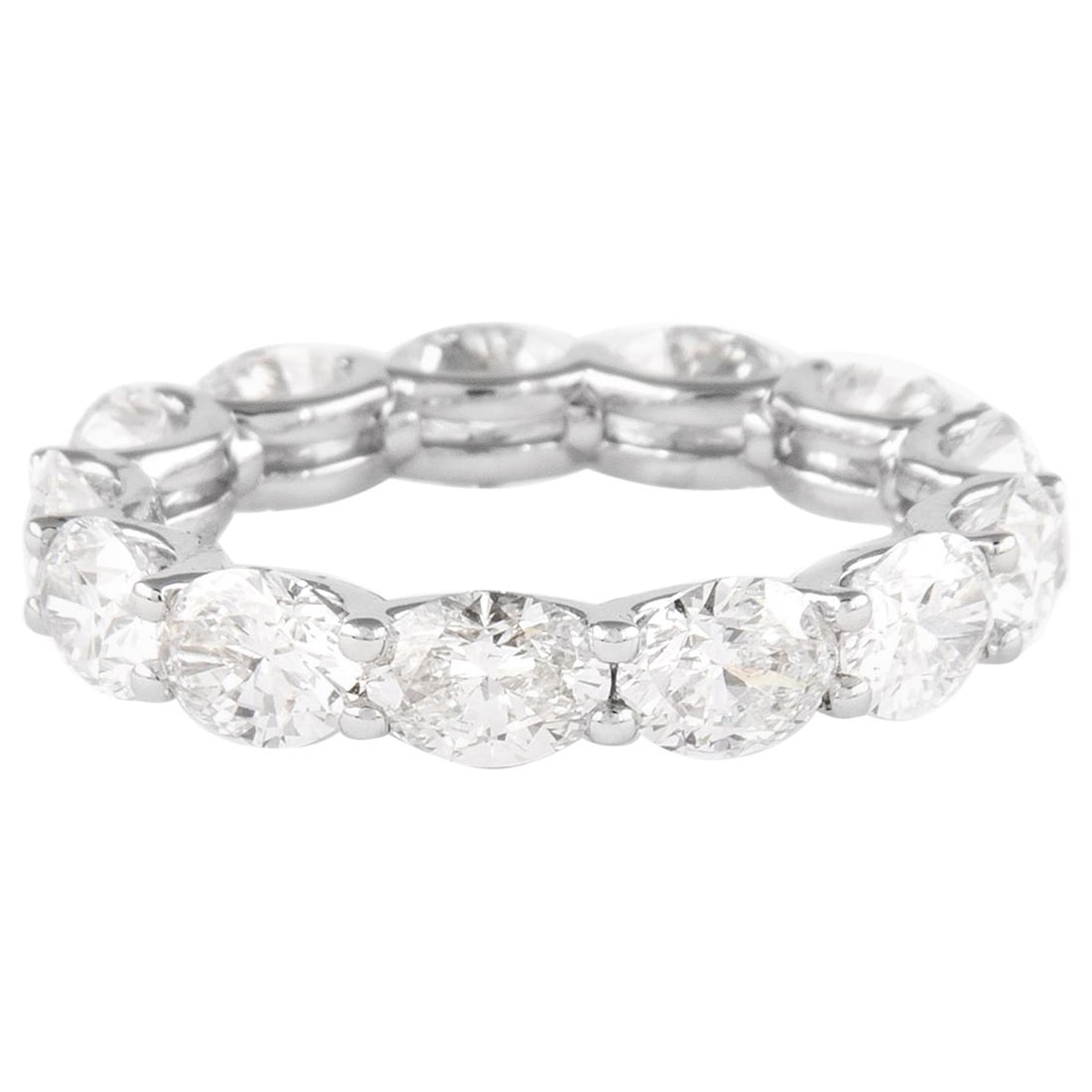5.39ct Oval Diamond Eternity Band 18k White Gold: 5.39ct Oval Diamond Eternity Band 18k White Gold This exquisite 5.39 ct oval diamond east-west half eternity band showcases a modern design crafted from 18k white gold. The ring features 13 stunning o