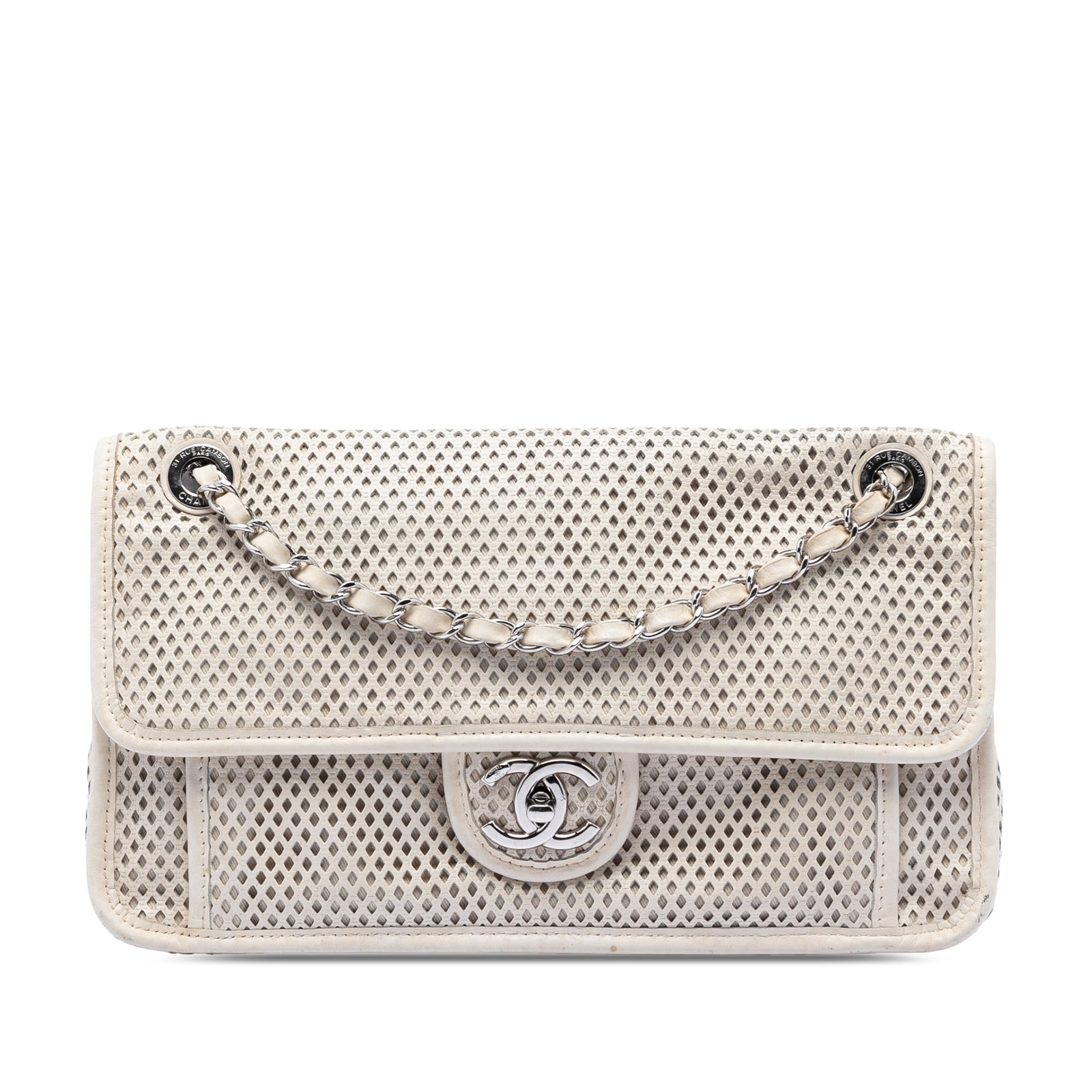Chanel White Perforated Calfskin Flap Bag Medium: Chanel White Perforated Calfskin Flap Bag Medium This Chanel Medium Perforated Calfskin Up In The Air Flap bag showcases a stylish perforated leather body in white, complemented by leather-woven chain