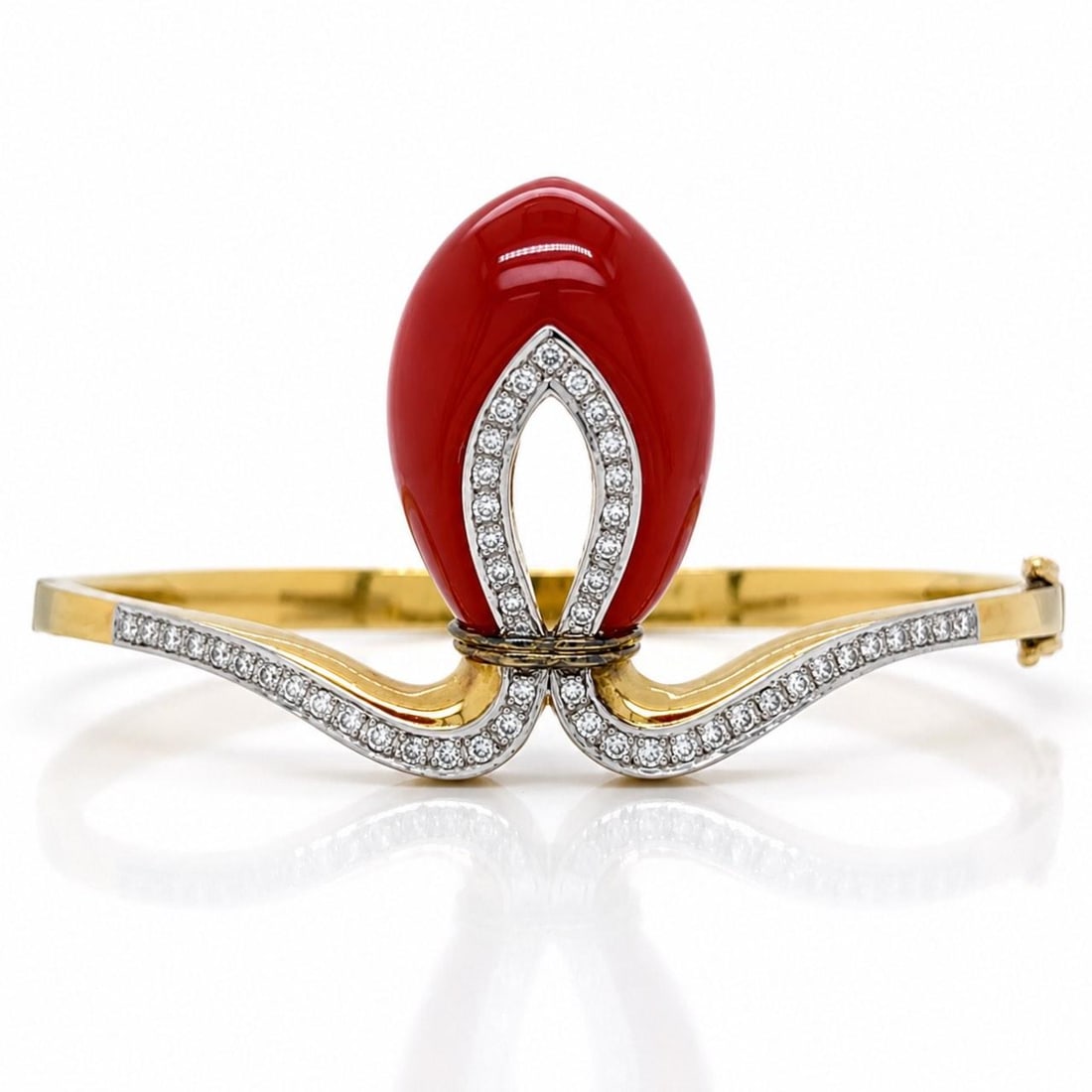 Larry Hallmark 14K Gold Bangle with Coral and 49 Diamonds: Larry Hallmark 14K Gold Bangle with Coral and 49 Diamonds This 1970s bangle is crafted from 14K yellow gold and features coral accents alongside 49 diamonds with a total weight of approximately 0.70 c