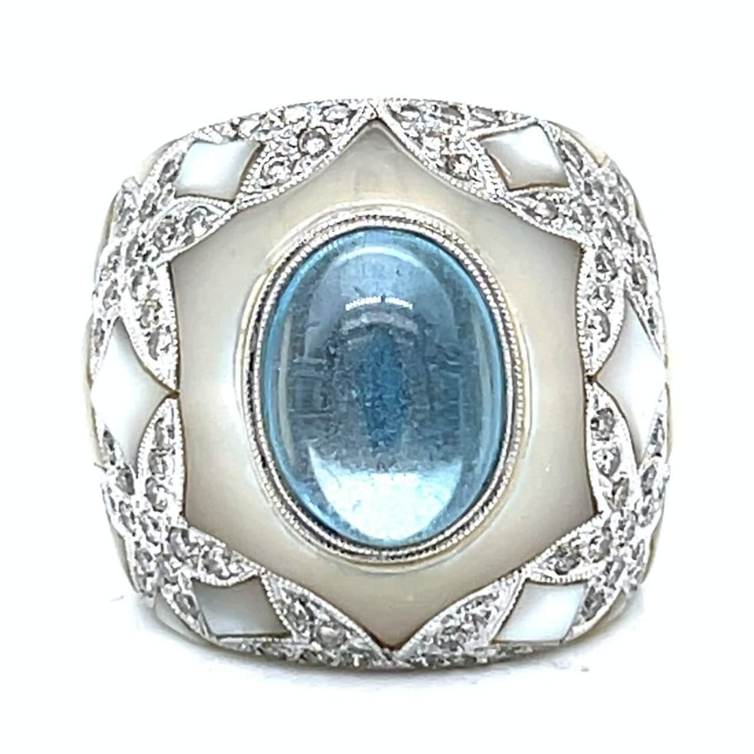 18K White Gold Mother of Pearl Diamond Ring with 80 Stones: 18K White Gold Mother of Pearl Diamond Ring with 80 Stones This elegant ring features a stunning combination of 18K white gold, mother of pearl, and diamonds. The piece weighs 17.8 grams and is adorne