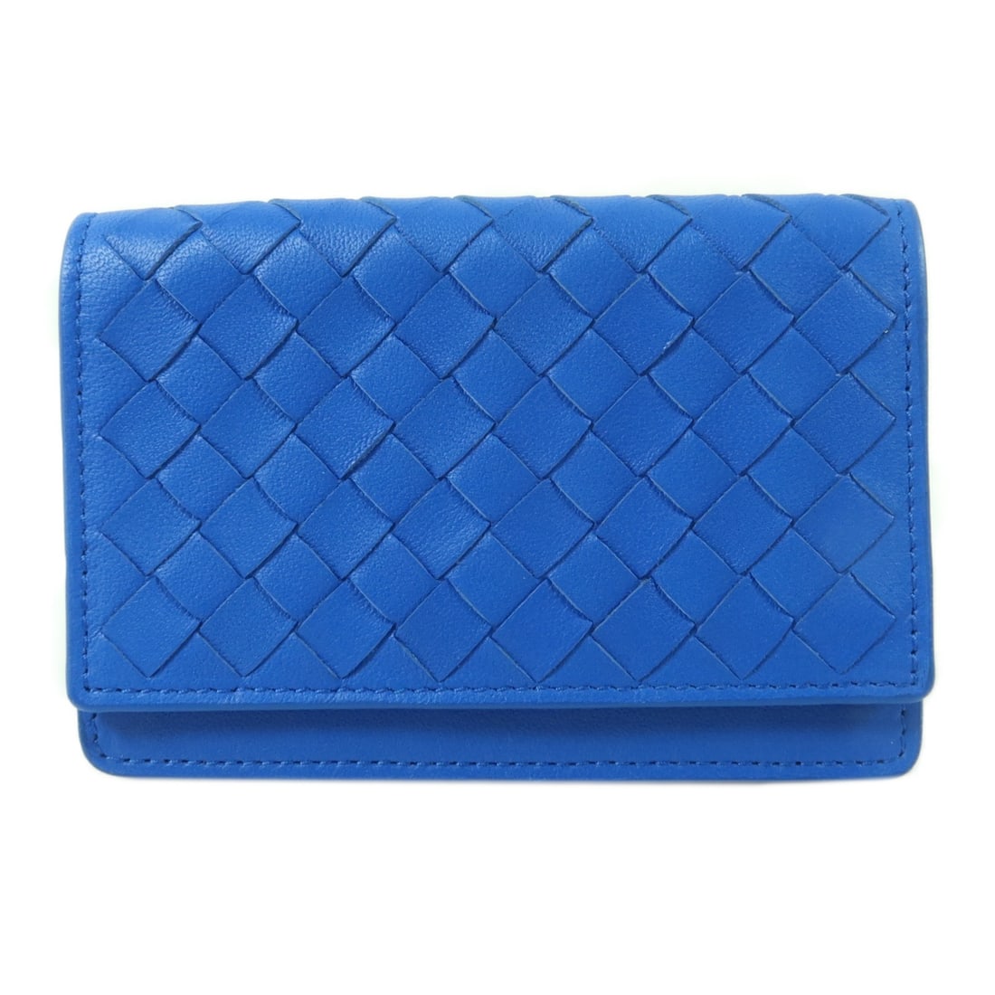 Bottega Veneta Blue Lambskin Card Case: Bottega Veneta Blue Lambskin Card Case This Bottega Veneta card case is crafted from soft lambskin leather in a striking blue color. Designed for unisex use, it offers a sleek and practical solution f