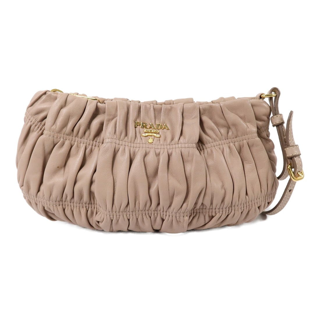 Prada Gaufre pink lambskin wristlet clutch GHW: Prada Gaufre pink lambskin wristlet clutch GHW This Prada Gaufre wristlet clutch bag is crafted from soft lambskin leather in a pink hue. Designed for women, it features a compact silhouette with a he
