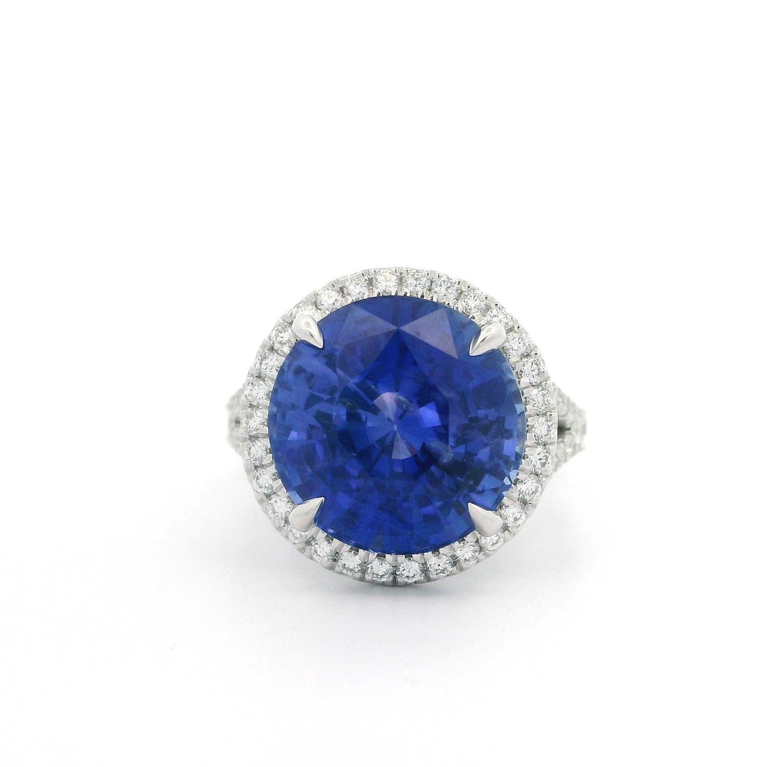 18k White Gold GIA Certified 10.74ct Round Sapphire Diamond Halo Ring: 18k White Gold GIA Certified 10.74ct Round Sapphire Diamond Halo Ring Introducing a stunning cocktail ring featuring a breathtaking 10.01ct natural round sapphire, complemented by a halo of 60 dazzlin