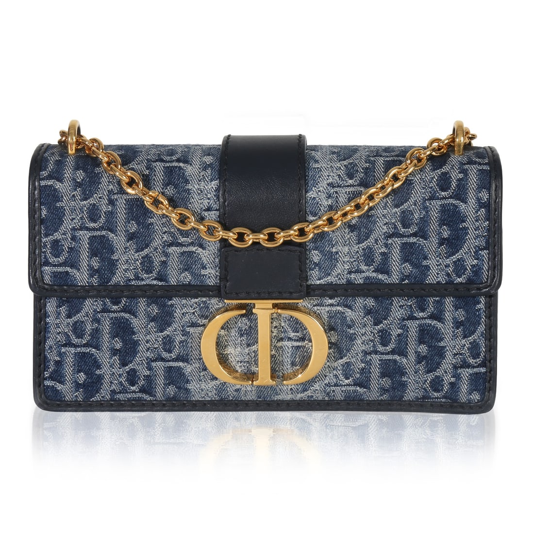 Christian Dior 30 Montaigne East West Chain Denim Bag: Christian Dior 30 Montaigne East West Chain Denim Bag This Christian Dior 30 Montaigne East West Chain Bag features blue denim with the signature Oblique pattern. The bag is designed with gold-tone ha