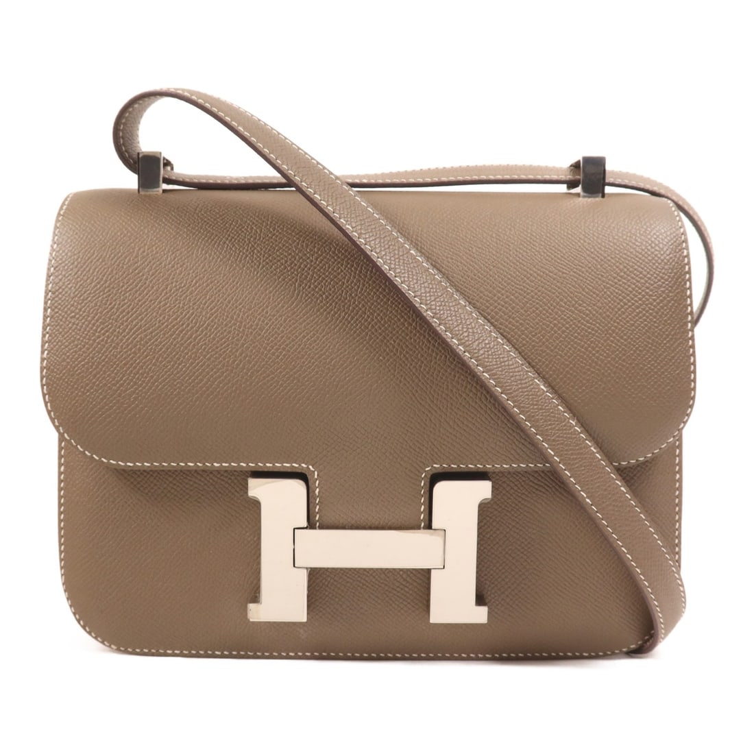 Hermes Constance 24 Etoupe Epsom Leather Shoulder Bag PHW: Hermes Constance 24 Etoupe Epsom Leather Shoulder Bag PHW This Hermes Constance 24 shoulder bag features luxurious Epsom calfskin leather in a sophisticated gray shade. Designed for women, it offers a