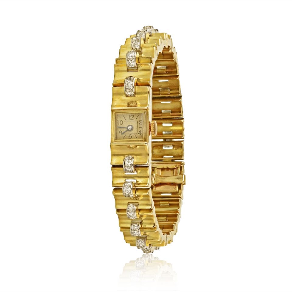 Van Cleef & Arpels 1940s 18K Yellow Gold Diamond Retro Watch: Van Cleef & Arpels 1940s 18K Yellow Gold Diamond Retro Watch This exquisite vintage wristwatch from Van Cleef & Arpels, crafted in the 1940s, features a stunning bracelet band made of 18K yellow gold.