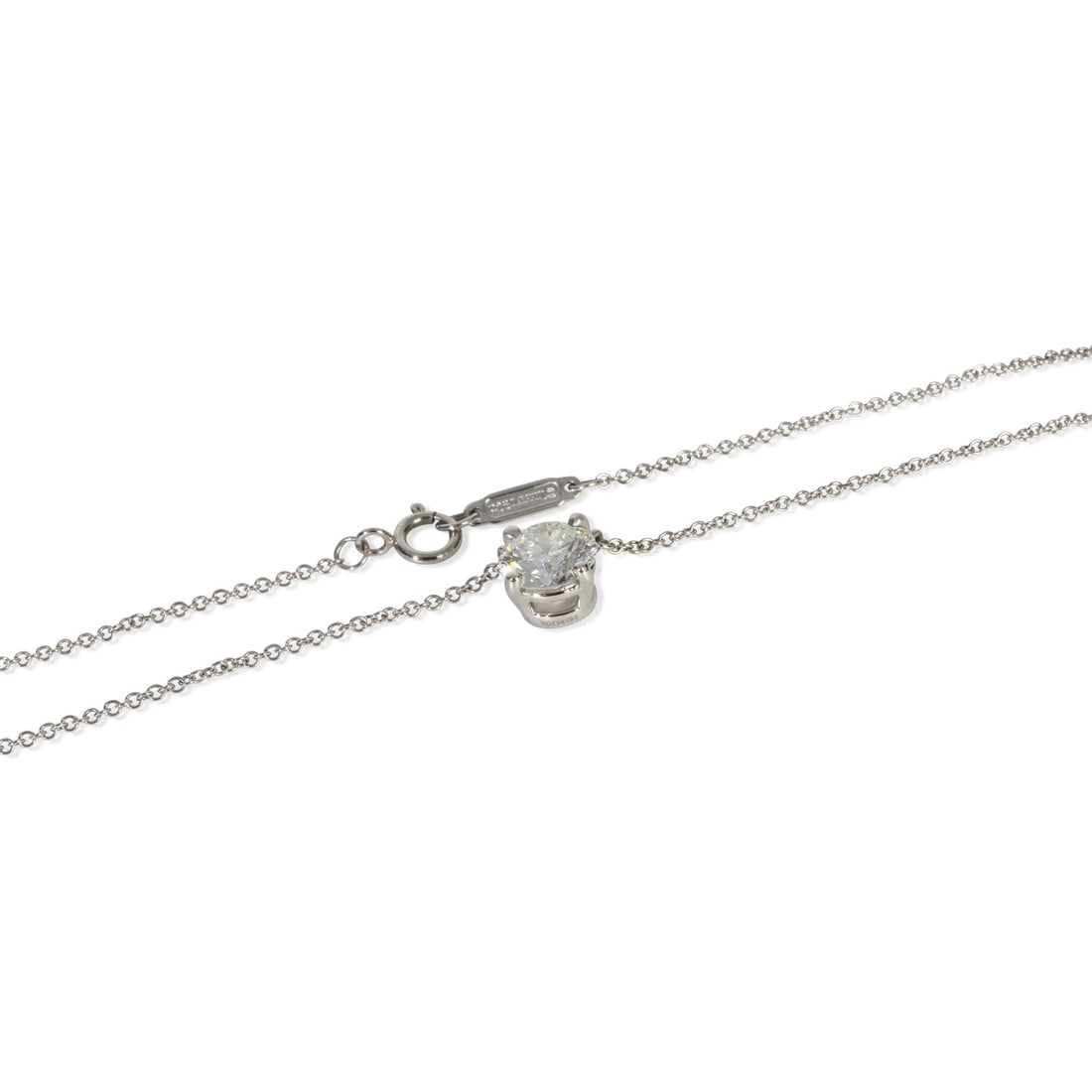 Platinum Pendant with 1.11ct Diamond and Certificate by Tiffany & Co.: Platinum Pendant with 1.11ct Diamond and Certificate by Tiffany & Co. This Tiffany & Co. platinum pendant features a 1.11 carat round diamond with excellent cut and polish, and VS1 clarity in an H col