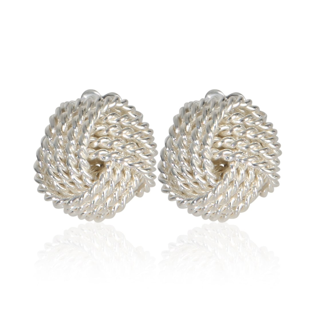 Tiffany & Co. Knot Sterling Silver Earrings: Tiffany & Co. Knot Sterling Silver Earrings These pre-owned Tiffany & Co. Knot earrings are crafted from 925 sterling silver and feature a timeless knot design. With a length of 8.5 mm, these unisex e