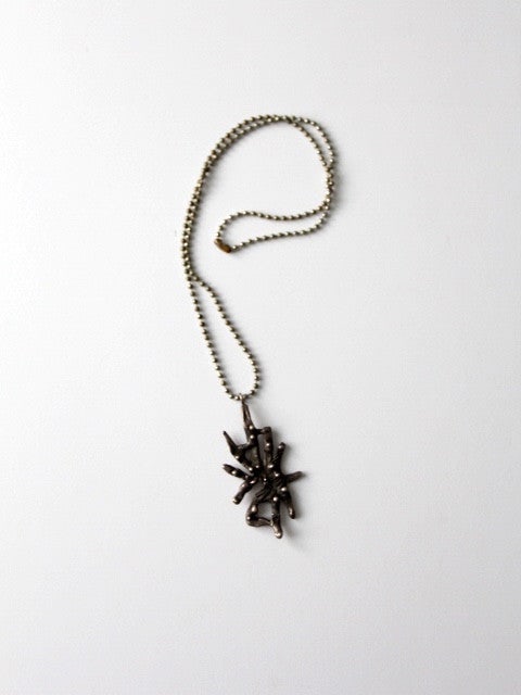 1970s Vintage Brutalist Pendant Necklace Silver Tone 22 Inch Chain: 1970s Vintage Brutalist Pendant Necklace Silver Tone 22 Inch Chain Discover a unique piece from the 1970s with this Vintage Brutalist Style Pendant Necklace. Crafted with a silver tone metal, the pend