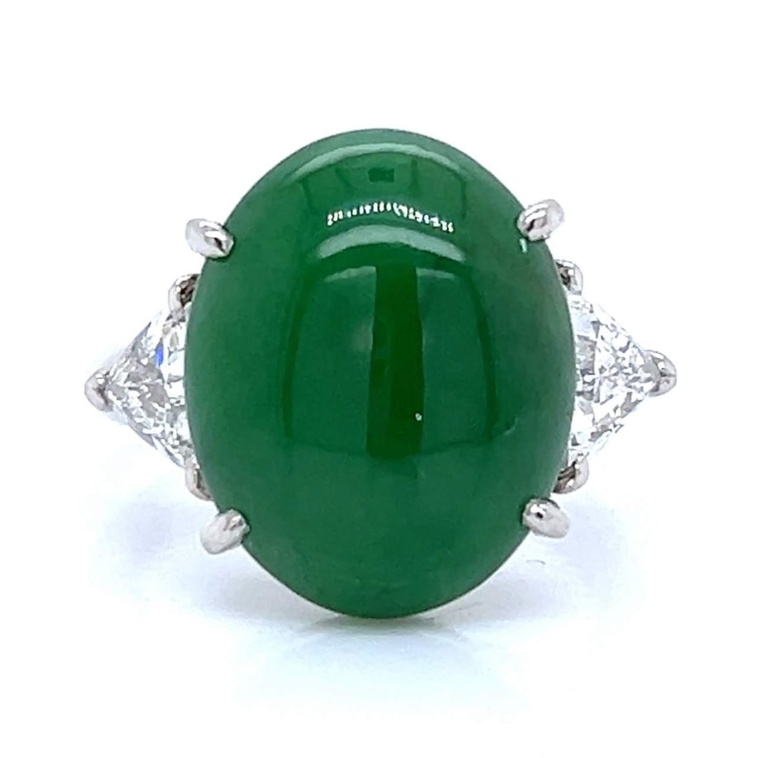 Stunning Platinum 9.81 Ct Jade Diamond Ring Elegant Design: Stunning Platinum 9.81 Ct Jade Diamond Ring Elegant Design This exquisite platinum ring features a stunning 9.81 Ct. green jade centerpiece, beautifully complemented by two diamonds totaling 0.98 Ct. 