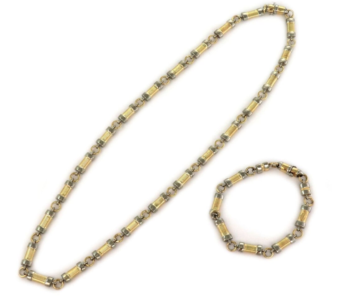 Vintage 14k Yellow White Gold Convertible Necklace Bracelet Fancy Bar Links: Vintage 14k Yellow White Gold Convertible Necklace Bracelet Fancy Bar Links This vintage convertible jewelry set features a necklace and bracelet crafted in solid 14k yellow and white gold. The set sh