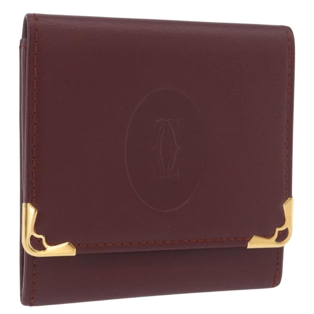 Bordeaux Leather Must Line Coin Purse by Cartier with Gold Accents: Bordeaux Leather Must Line Coin Purse by Cartier with Gold Accents This Cartier Must Line coin purse features luxurious Bordeaux leather with gold-tone accents. The compact design is crafted for women