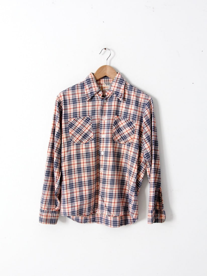 1970s Vintage Plaid Cotton Shirt Red White Blue: 1970s Vintage Plaid Cotton Shirt Red White Blue Discover this charming vintage plaid button-up shirt from the 1970s to 1980s, crafted from soft 100% cotton. It showcases a classic red, white, and blue