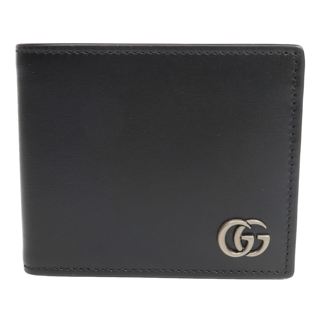 Gucci GG Marmont black calfskin bi-fold wallet: Gucci GG Marmont black calfskin bi-fold wallet This GUCCI GG Marmont bi-fold wallet is crafted from luxurious black calfskin leather. Designed for women, it features a sleek and timeless silhouette, o