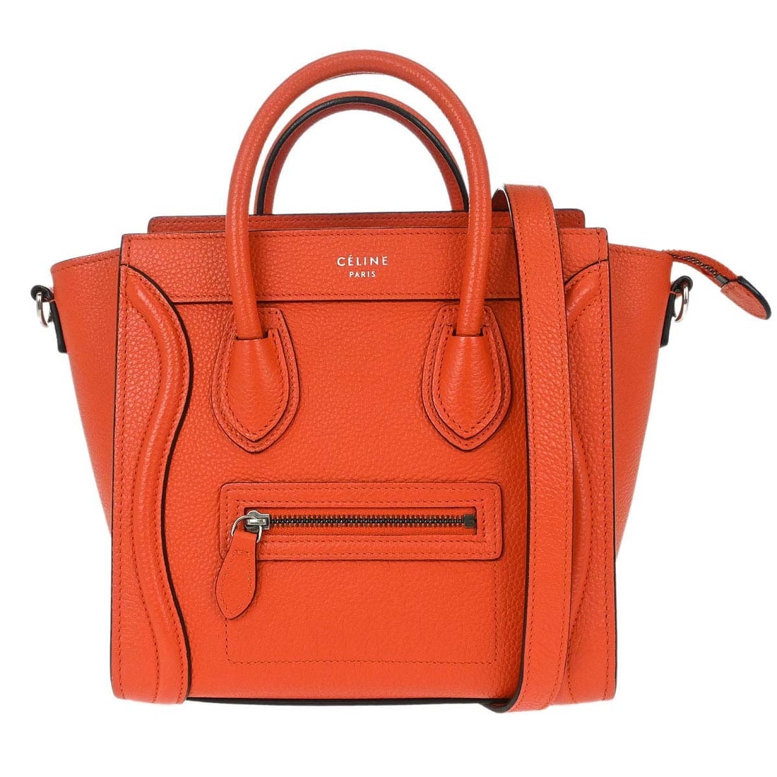 CELINE Nano Luggage red leather top handle bag: CELINE Nano Luggage red leather top handle bag This Celine Nano Luggage 2way tote bag features a compact, mini silhouette crafted from leather with a vibrant red exterior and matching lining. Designed