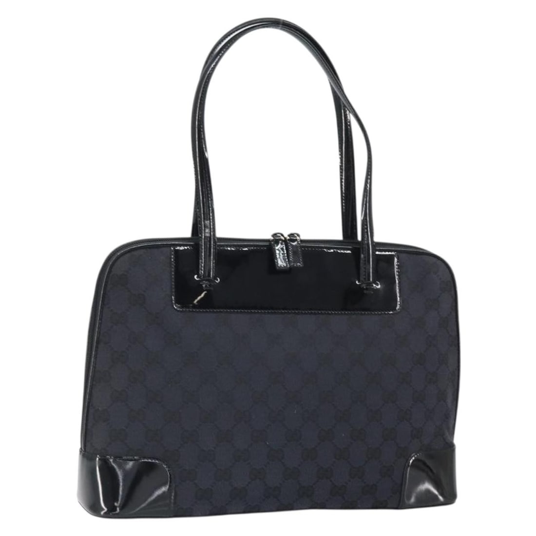 Black GG Canvas Gucci Tote with Silver Accents 002 1122 Italy: Black GG Canvas Gucci Tote with Silver Accents 002 1122 Italy This is a Gucci GG Canvas tote bag in black and silver, featuring the signature GG canvas material. The bag offers a spacious interior and