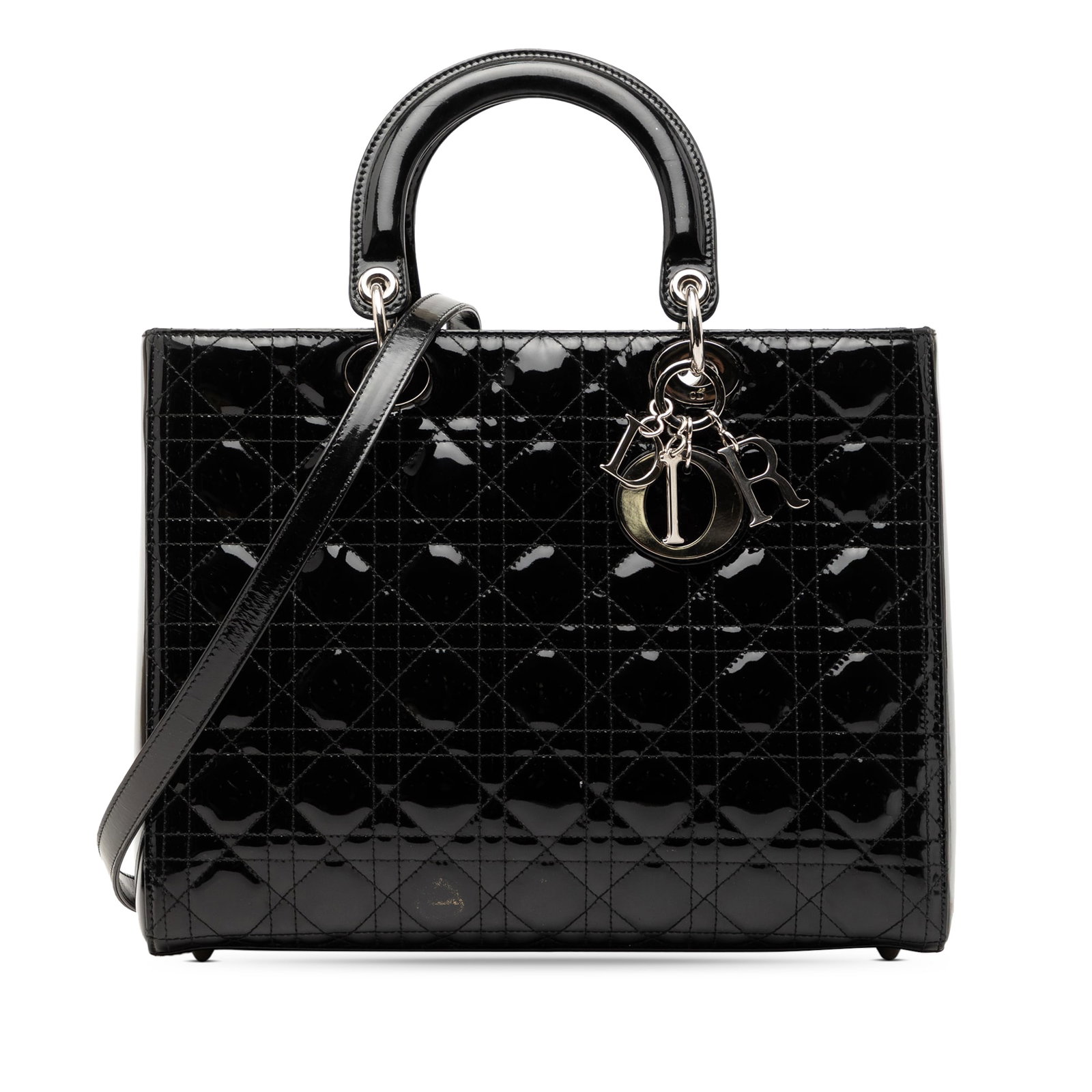 Dior Lady Dior Cannage Large Black Patent Leather Handbag with Strap: Dior Lady Dior Cannage Large Black Patent Leather Handbag with Strap This Lady Dior handbag features a quilted patent leather body in black, flat leather top handles, a detachable flat leather strap, 