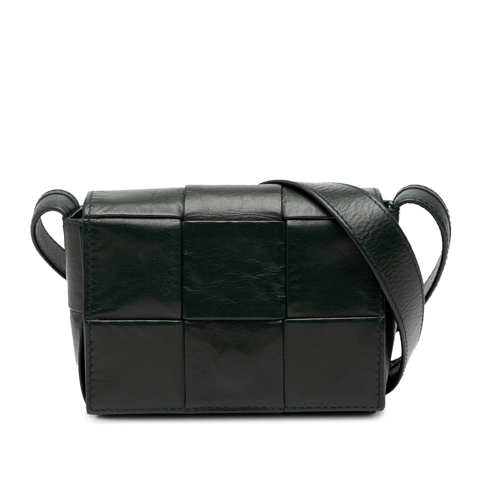 Black Intrecciato Leather Cassette Crossbody Bag by Bottega Veneta: Black Intrecciato Leather Cassette Crossbody Bag by Bottega Veneta This Bottega Veneta Candy Nappa Intrecciato Cassette Crossbody bag showcases the brand's signature woven nappa leather design in blac