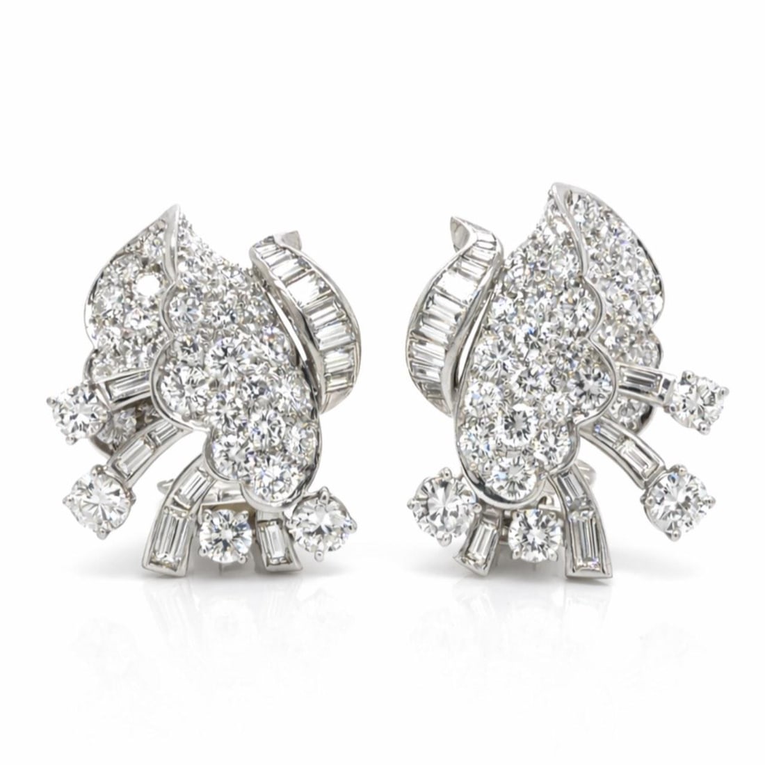 Platinum Diamond Drop Earrings 6.00 Carat Art Deco Style with Baguette Accents: Platinum Diamond Drop Earrings 6.00 Carat Art Deco Style with Baguette Accents These Art Deco earrings are crafted in platinum and feature a total diamond weight of approximately 6.00 carats. The earr