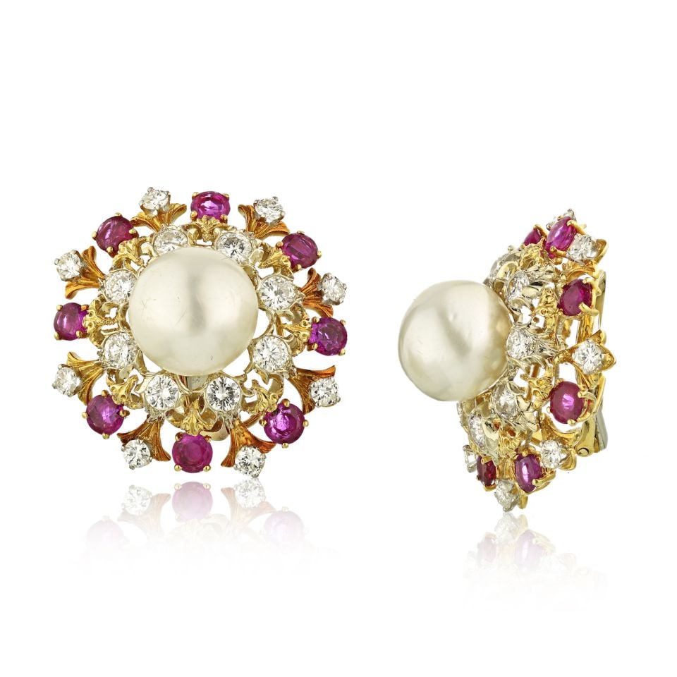 David Webb Platinum Pearl Diamond Ruby Earclips 4.00 cts Diamonds 5.00 cts Rubies: David Webb Platinum Pearl Diamond Ruby Earclips 4.00 cts Diamonds 5.00 cts Rubies Exquisite David Webb Platinum Pearl Diamond and Ruby Earrings that showcase a stunning design. These elegant earclips 