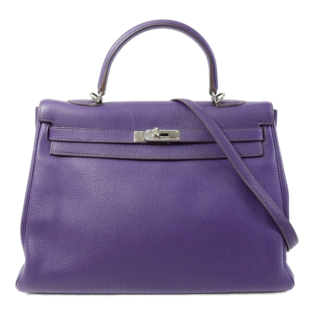 Hermes Kelly 35 Iris Togo Leather Two Way Purple Shoulder Bag PHW: Hermes Kelly 35 Iris Togo Leather Two Way Purple Shoulder Bag PHW This Hermes Kelly 35 2-way shoulder bag is crafted from Togo leather in a rich iris purple shade. Designed for versatility, it can be 