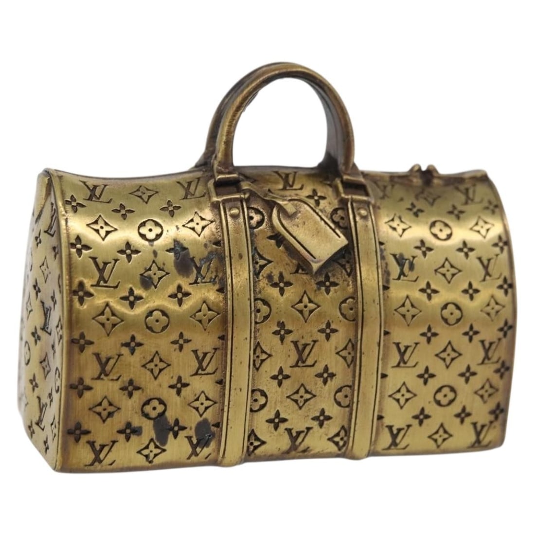Louis Vuitton gold metal Keepall motif paperweight with box: Louis Vuitton gold metal Keepall motif paperweight with box This Louis Vuitton Keepall Motif paperweight is crafted from gold-toned metal and features the iconic brand motif. Made in France, it is des