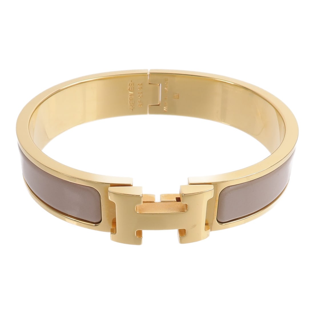 Hermes Clic H Khaki Metal Bracelet GHW: Hermes Clic H Khaki Metal Bracelet GHW This HERMES Clic-H bracelet features a khaki-colored metal design with gold-tone hardware, offering a sophisticated accessory for women. Crafted in France, the b
