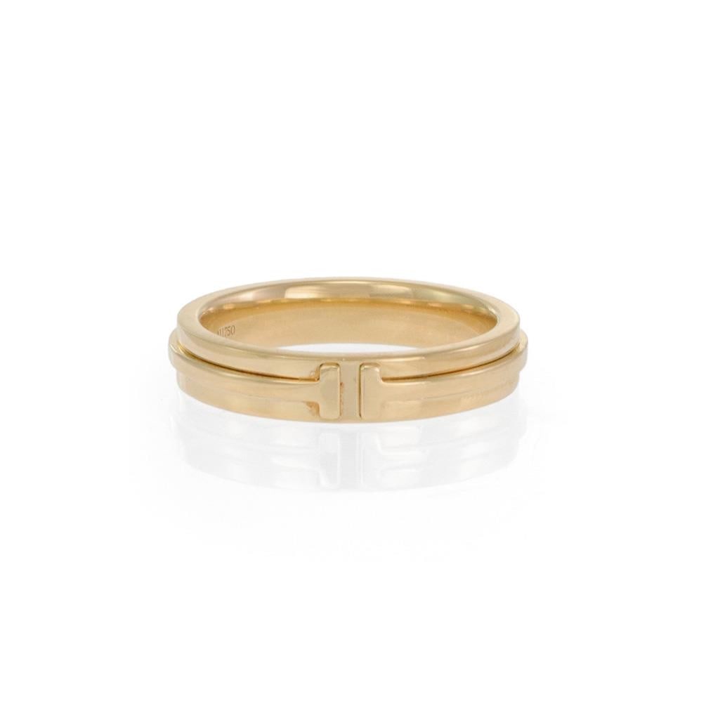 Tiffany T Wide 18k Yellow Gold Band Ring Size 8.5 Signed: Tiffany T Wide 18k Yellow Gold Band Ring Size 8.5 Signed Discover the elegance of the Tiffany T Wide Band Ring, a stunning piece from the renowned Tiffany T Wide Collection. This authentic ring is exp