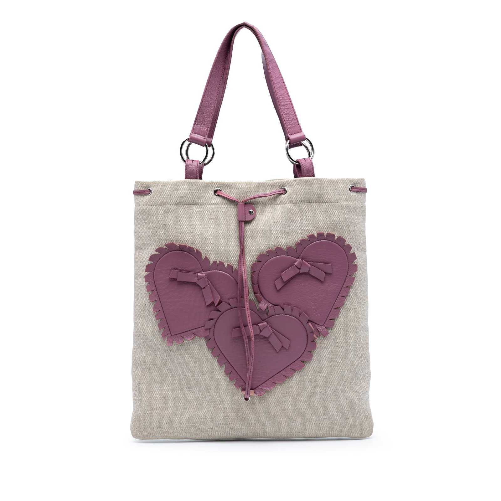 Saint Laurent Canvas Fringed Heart Tote Bag Italy: Saint Laurent Canvas Fringed Heart Tote Bag Italy This stylish Saint Laurent tote bag is crafted from durable canvas and adorned with fringed leather heart appliques. It features flat leather handles 