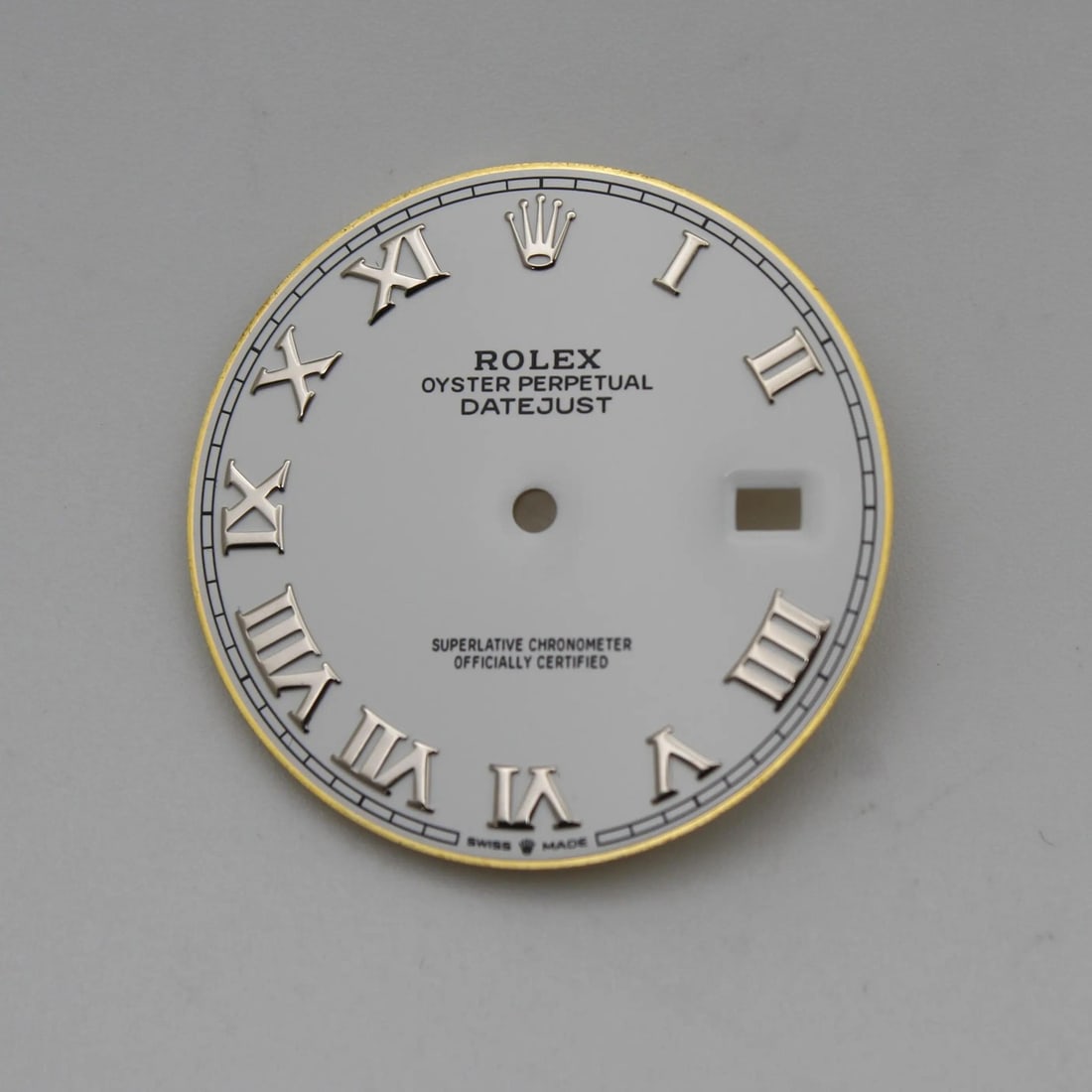 Rolex Datejust Dial 126334 126300 Luxury Roman Numerals: Rolex Datejust Dial 126334 126300 Luxury Roman Numerals This luxurious Rolex Datejust watch dial is compatible with models 126334 and 126300. Crafted in Switzerland, this pre-owned dial is in good con