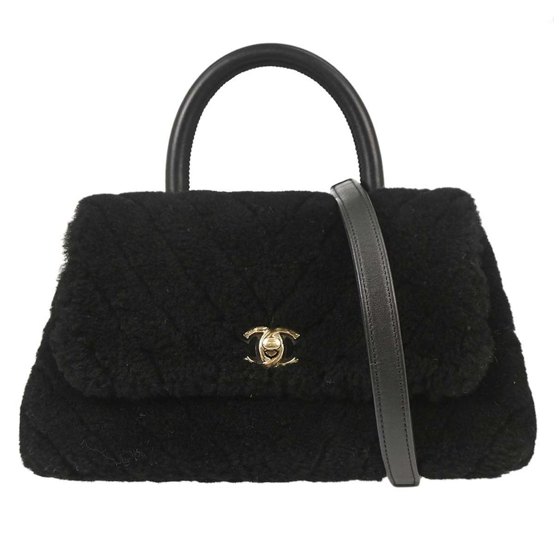 CHANEL Coco Handle Black Chevron Mouton Top Handle Bag: CHANEL Coco Handle Black Chevron Mouton Top Handle Bag This Chanel Coco Handle 2-way handbag features a black chevron-patterned mouton leather exterior and a classic turn lock closure. Designed in a m